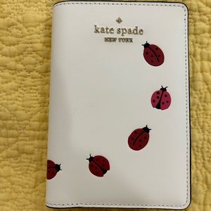 Kate Spade ladybug passport carrier